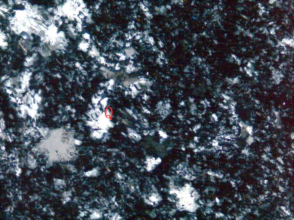 蚀变球粒霏细岩