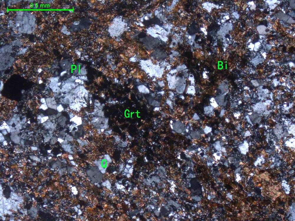 灰色含石榴石黑云斜长片岩