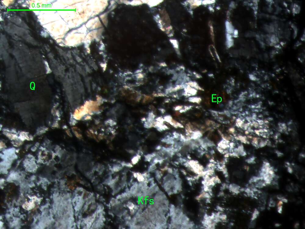 蚀变中细粒碱长花岗岩