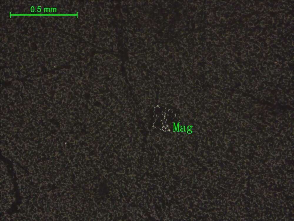 轻度蚀变霏细岩